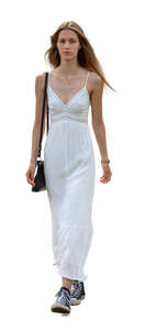 cut out young woman in a casual white dress walking