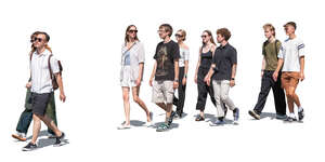 large group of young people walking in the street