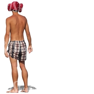 young man in swimming pants standing barefoot