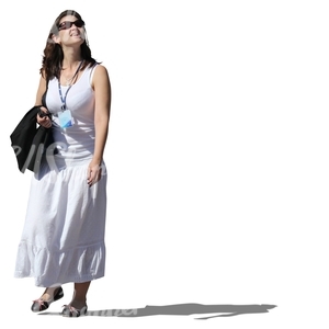 cut out woman in a white dress walking
