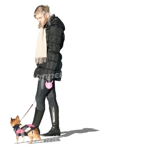 cut out woman standing with a dog in winter