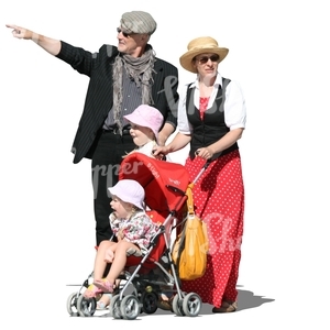 family of four standing and pointing at smth