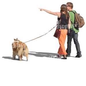 couple walking a dog and pointing at smth