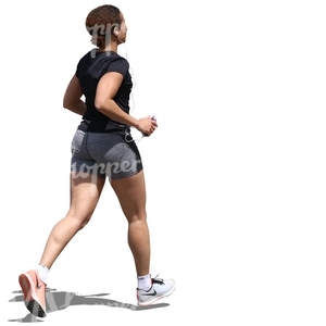 black woman jogging and listening to music