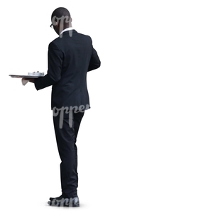 black waiter standing with a tray