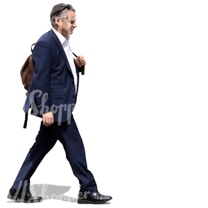 businessman with a leather backpack walking