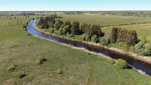 top view landscape with river and grasslands