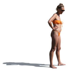 cut out woman in bikini standing at the beach