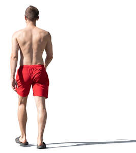 cut out man in swimming shorts walking