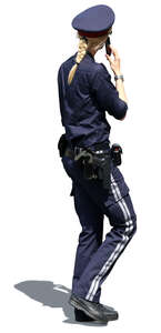 female police officer walking and talking on the phone