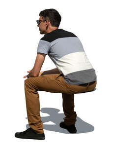 cut out man sitting outside in the sunlight