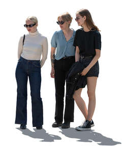 cut out backlit group of women standing and looking at smth