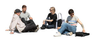 cut out group of young people sitting outside on the ground