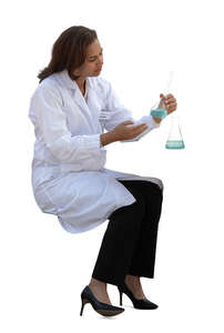 cut out lab worker studying test tubes
