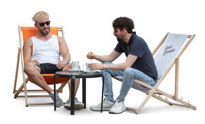 two men sitting in a casual cafe drinking coffee
