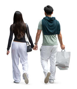 cut out young couple with shopping bags walking hand in hand