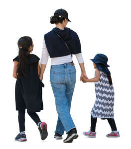 cut out asian woman with two daughters walking hand in hand