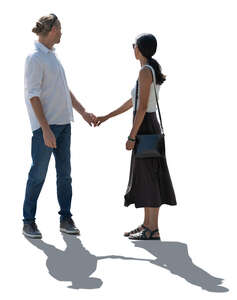 cut out backlit man and woman looking around