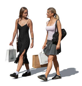 two cut out teenage girls coming from shopping