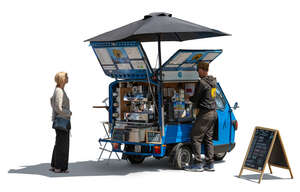 woman buying coffee from a street vendor