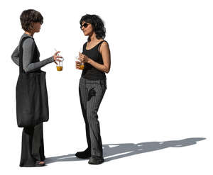two women standing and talking