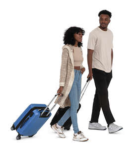 two cut out people with suitcases walking at the airport
