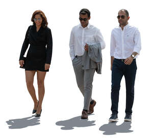 cut out backlit group of three people walking