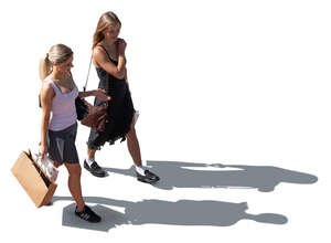 top sidelit view of two young women walking