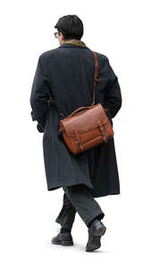 cut out man with a long thick overcoat walking