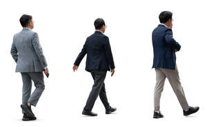 three cut out asian men in suit walking