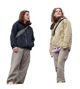 two cut out women standing and talking seen from below