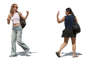 two women waving goodbye to each other