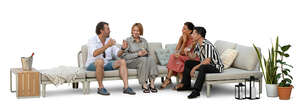 cut out group of friends sitting on a patio sofa and talking