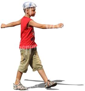 young boy with a hat walking arms apart