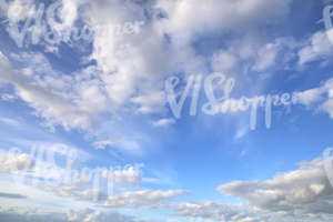 daytime sky with some regular clouds