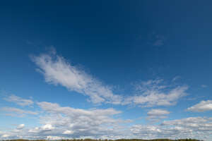 blue daytime sky with some clouds