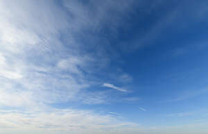 blue daytime sky with light clouds