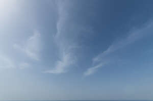 daytime sky with few white clouds