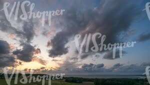 time lapse video of an evening sky in pink colours