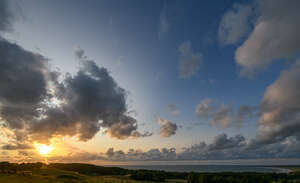 sunset with sun and clouds