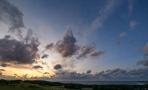sunset with clouds and golden sky