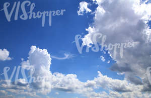 daytime sky with cumulus clouds