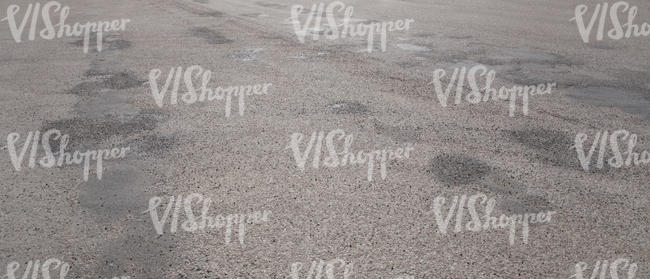 ashpalt square with some wet spots