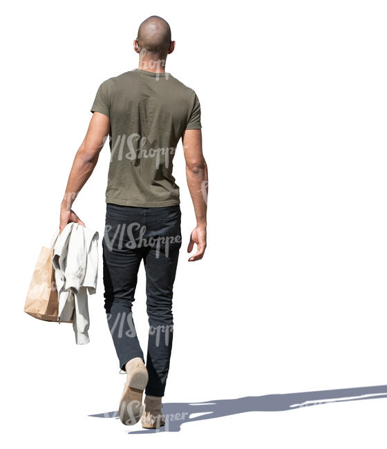 man with a small shopping bag walking
