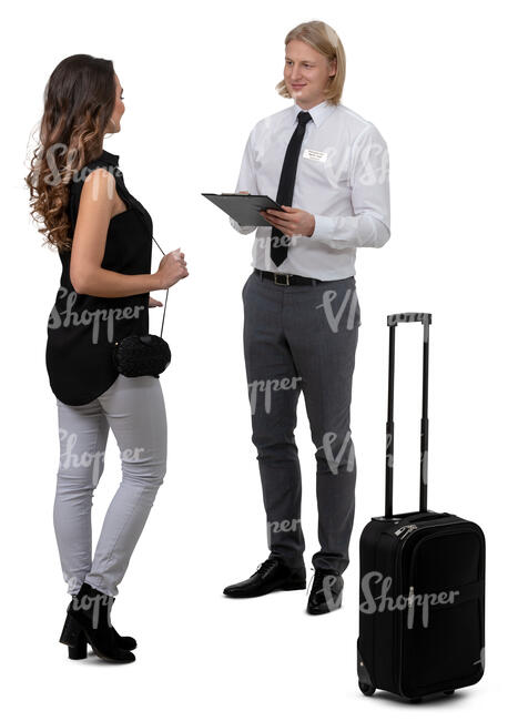 woman standing and talking to a hotel receptionist