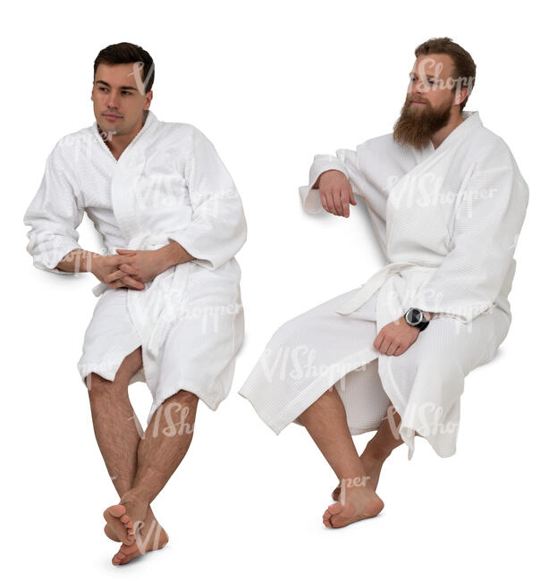 two cut out men in bathrobes sitting in a spa