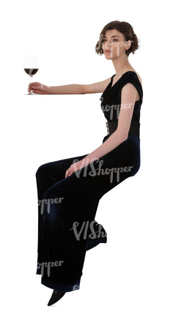 cut out woman sitting at a bar and drinking red wine