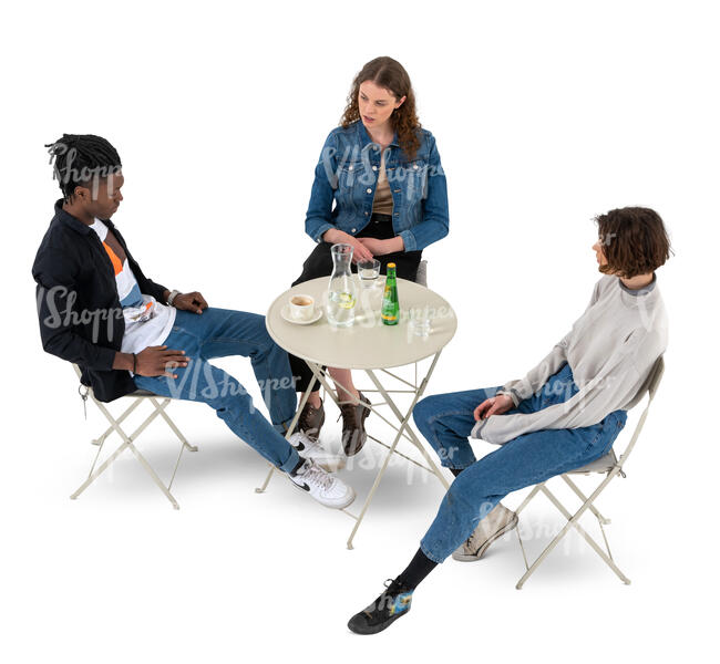 cut out top view of a group of three friends sitting in a cafe 