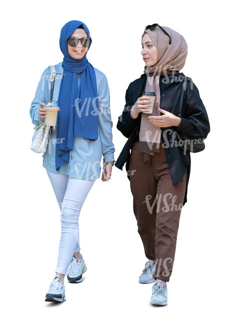 two cut out young muslim women walking and drinking coffee