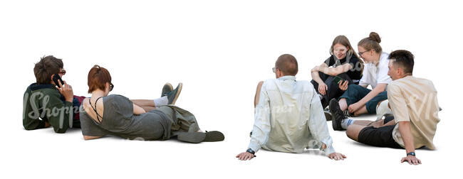 group of young people sitting and lying in the park